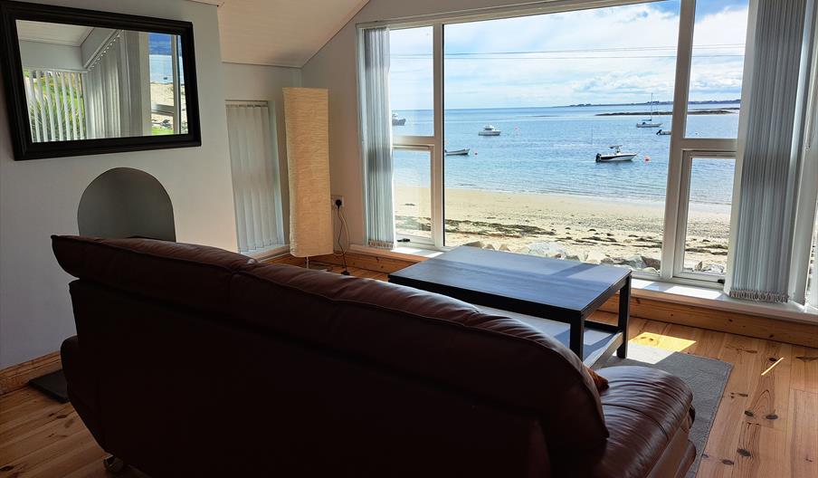 sitting area with a view of the beach