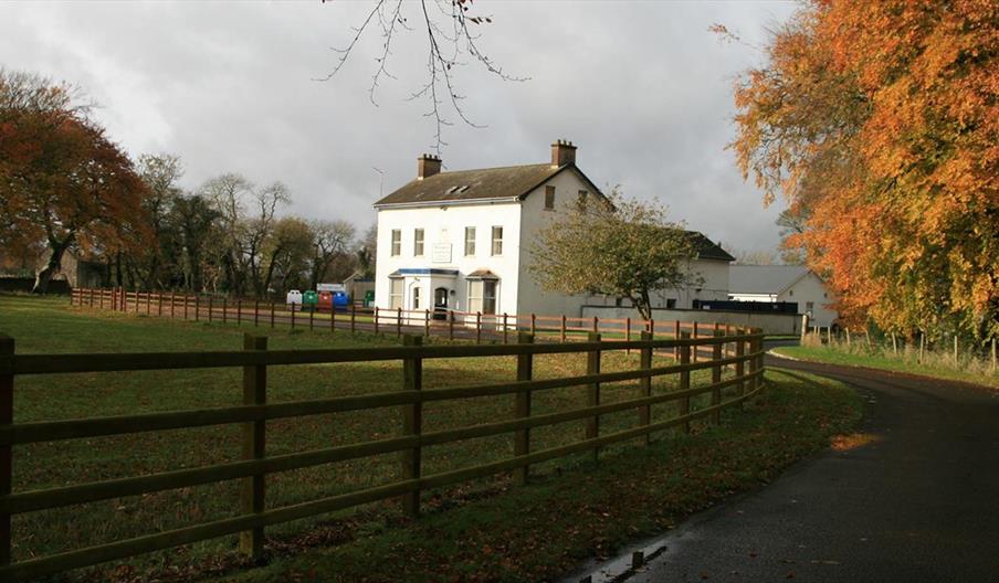 Outside photo of Kilcronaghan Centre with laneway and large grass area