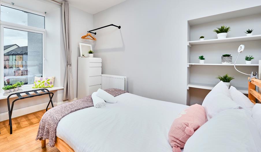 double bed room with view out the window