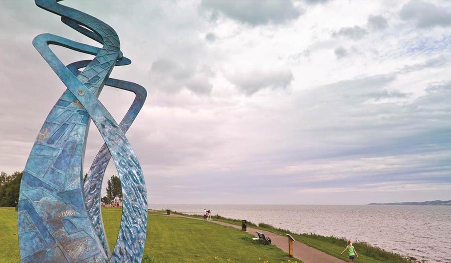 A sculpture along the path in the park.