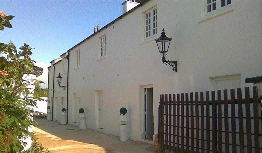 Outside image of white 2 storey building