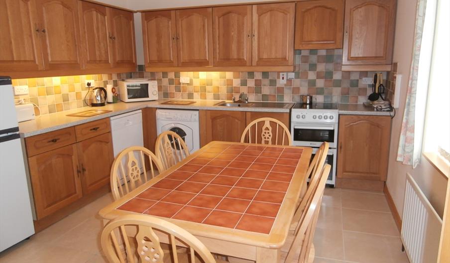 kitchen with dining table at No.6 - Strathroy Mews
