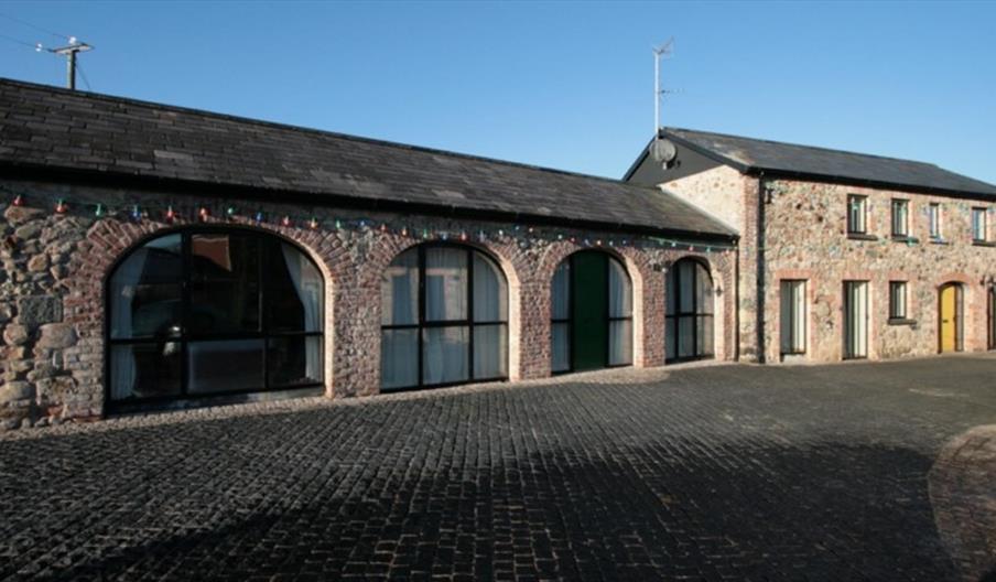image of the arched windows in a long building