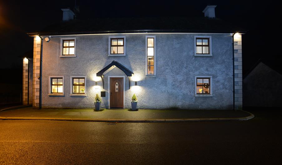 Beech House front view at night