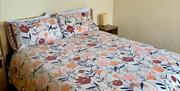 Bed with floral bedding