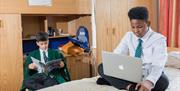 Two pupils in their dorm