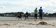 Couple Walking on Millisle Beach Park