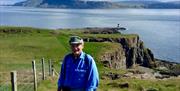 8. Absolute Escapes client, John, walking the Moyle Way and Causeway Coast Way
