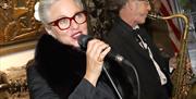 American singer Kristine Mills singing in the Northern Ireland War Memorial museum on Culture Night 2025