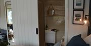 Double bed and bathroom