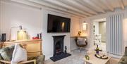 Bright living room with cosy fireplace