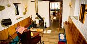 The sitting room with wood-burning stove.