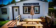 The Boat Builder’s Yard, Portaferry with Summer table and bench outside.